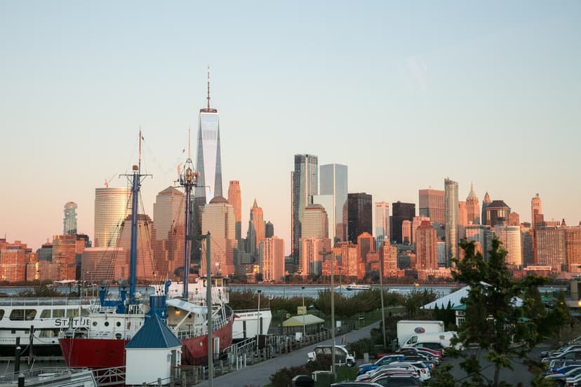 Manhattan skyline harbor view at sunset