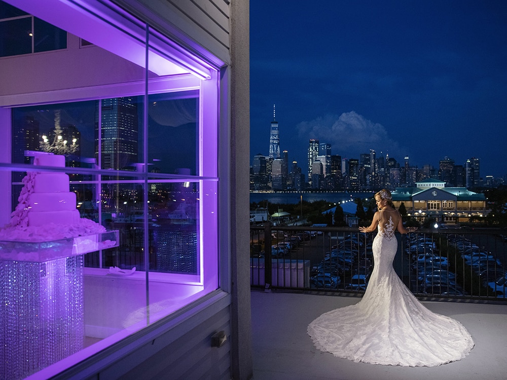 Bride with Manhattan skyline at night