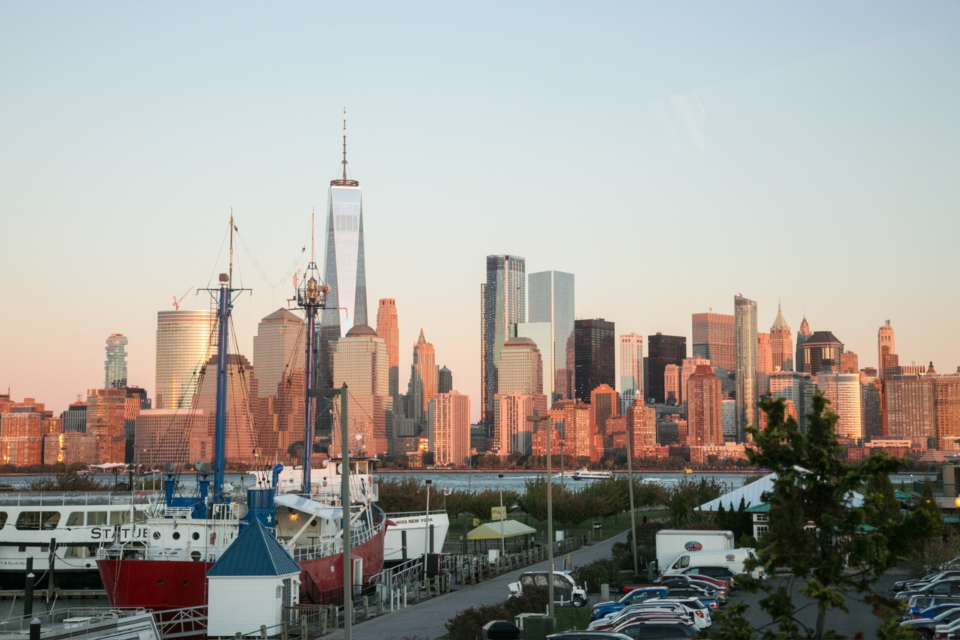 Manhattan skyline harbor view at sunset